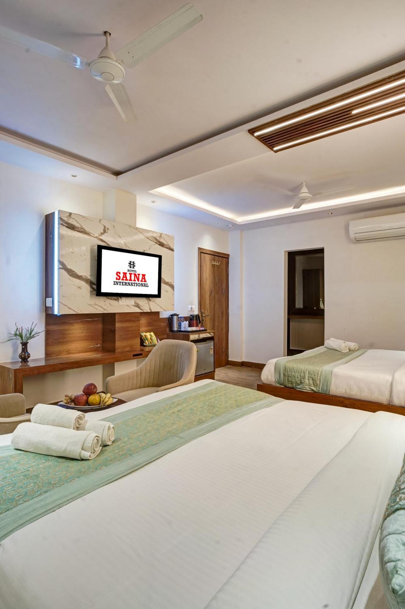 Hotel Saina International New Delhi Extérieur photo