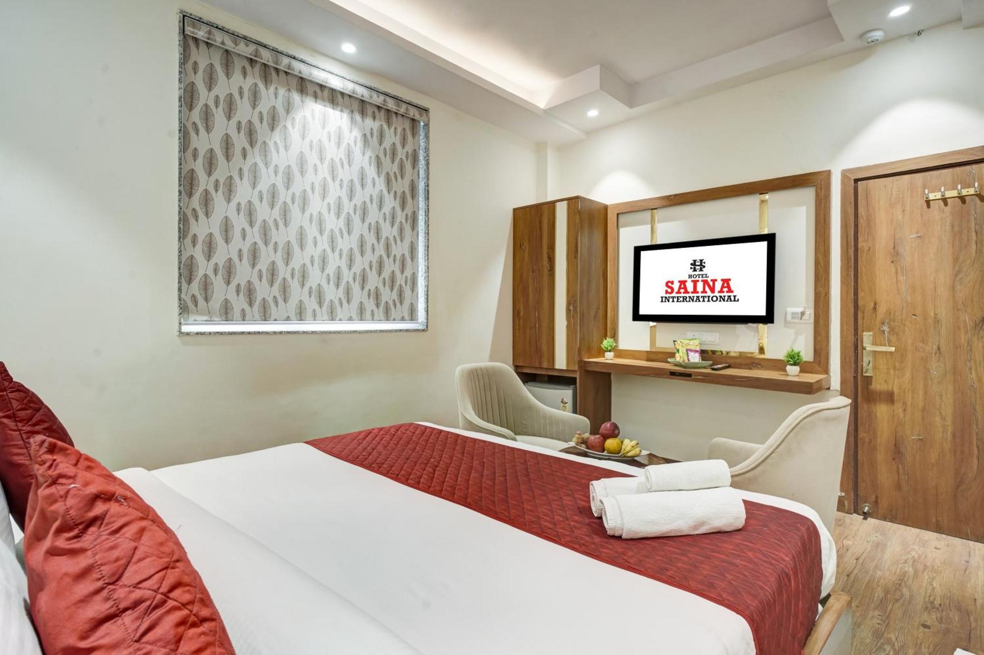 Hotel Saina International New Delhi Extérieur photo